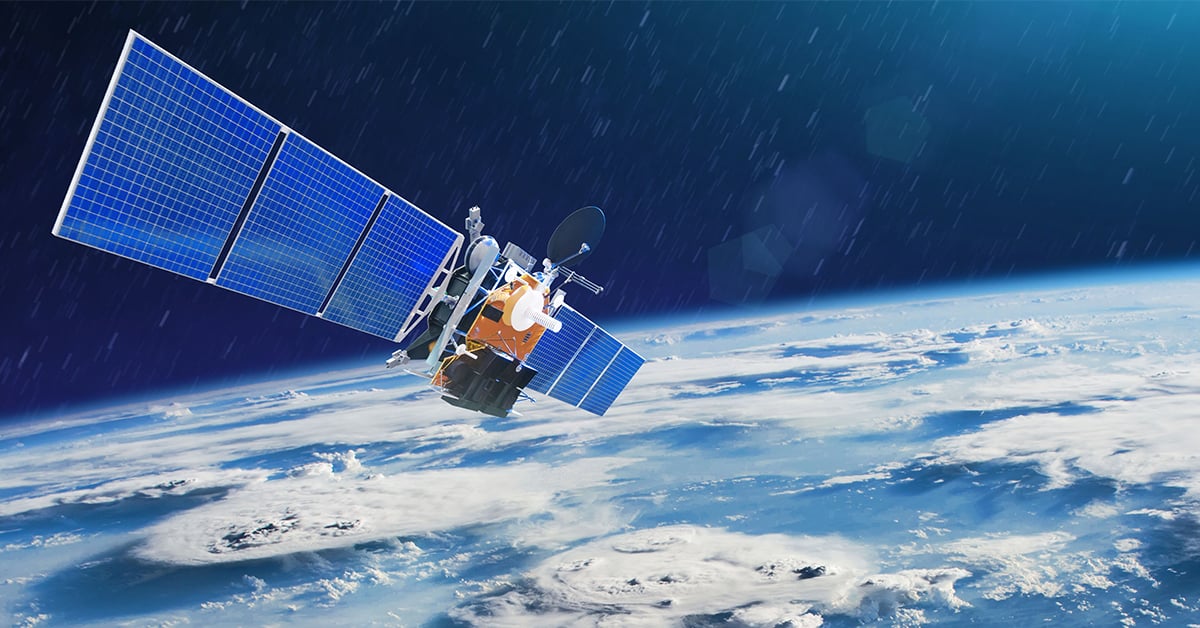 Satellite propulsion system in space orbiting the earth.